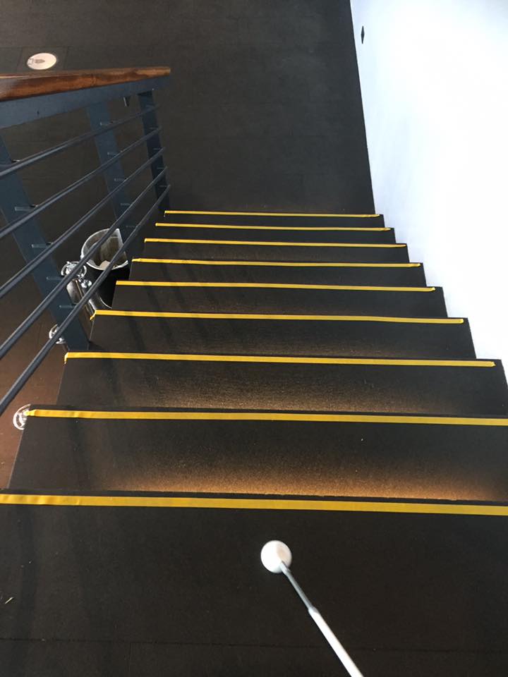 Stairs with yellow tape
