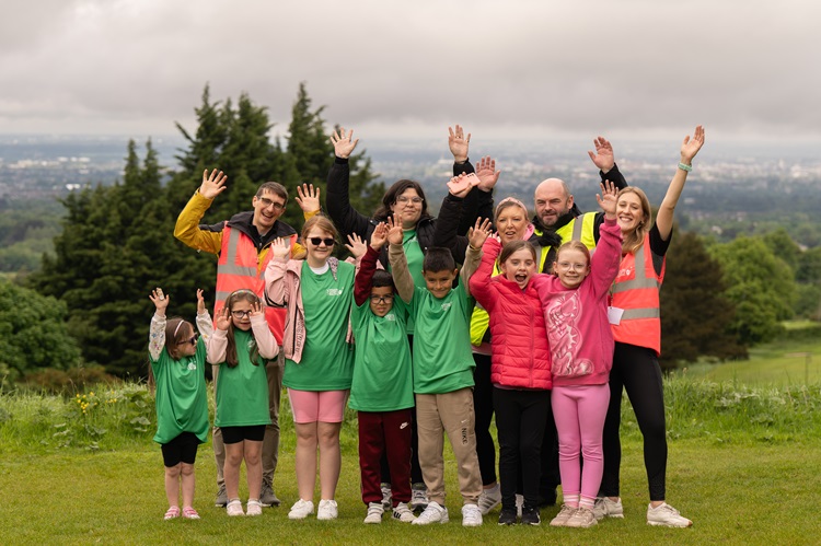 a group of participants and volunteers standing on the green at Stackstown Golf Club